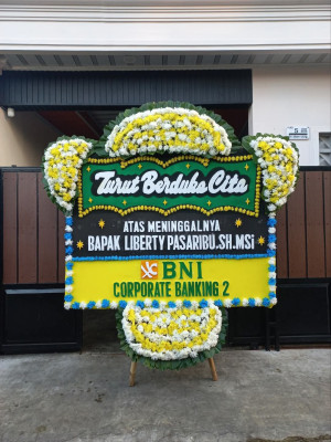 Papan Bunga Duka di Titipapan