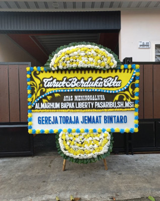 Papan Bunga Duka di Titipapan