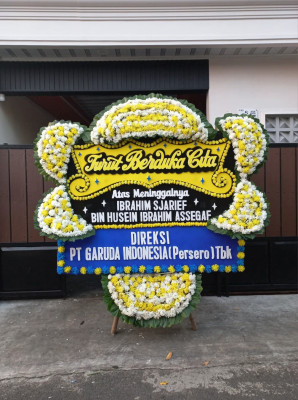 Papan Bunga Duka di Titipapan