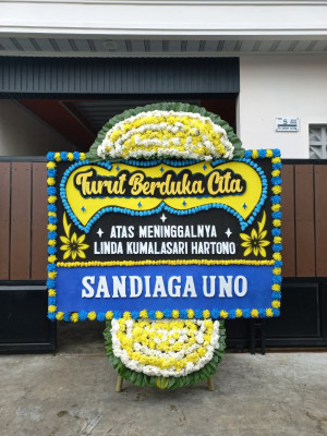 Papan Bunga Duka di Titipapan
