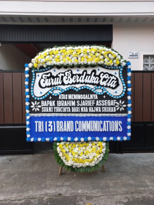 Papan Bunga Duka di Titipapan